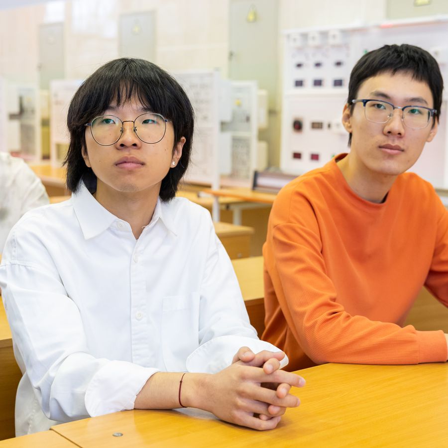 Two international students in a classroom