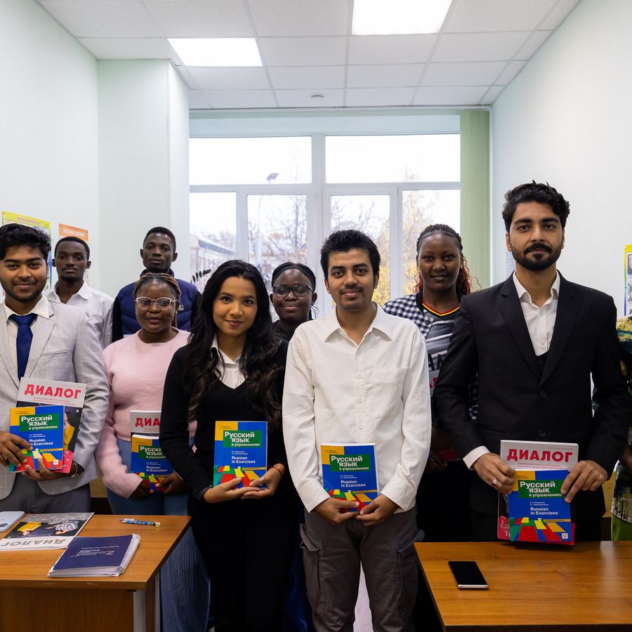 A Foundation programme group holding their textbooks