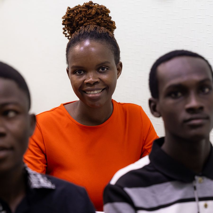 Classmates smiling during a lesson